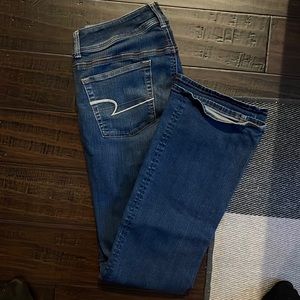 American Eagle Women’s Denim Super Stretch Kick Boot (10 Long) - Medium Wash